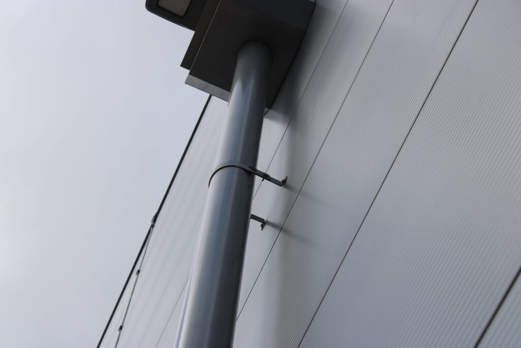 High-quality gutter downpipe systems displayed by Alutech Precision Engineering for effective rainwater management.