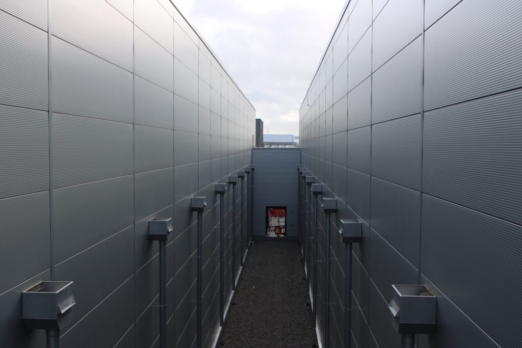 Gutter downpipe systems by Alutech Precision Engineering for efficient rainwater management solutions.